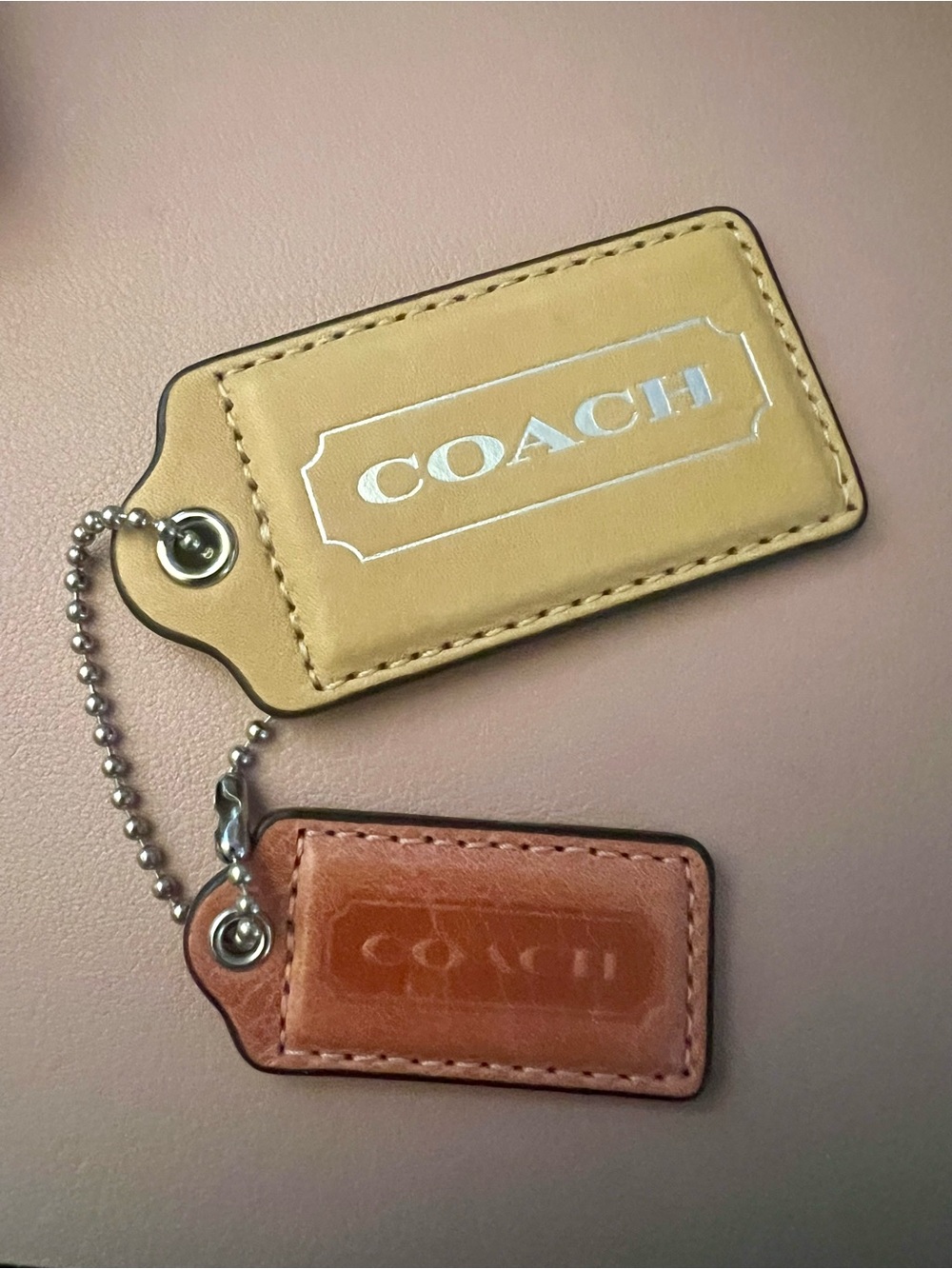 Set of two Coach tags